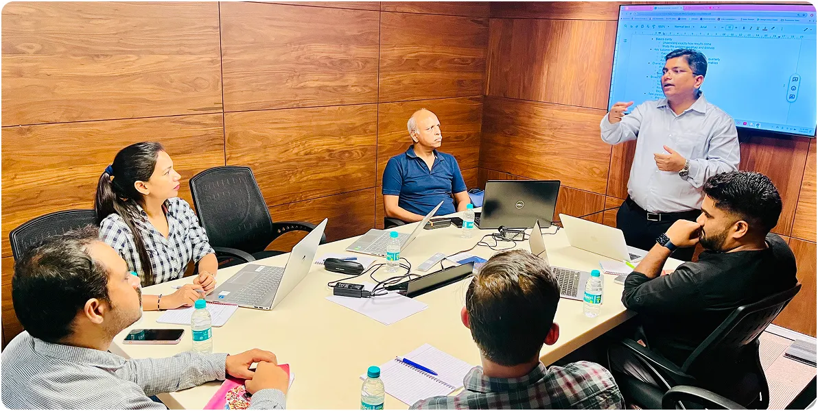 Quickway Infosystems team in a project meeting